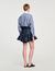 Short denim ruffled skirt