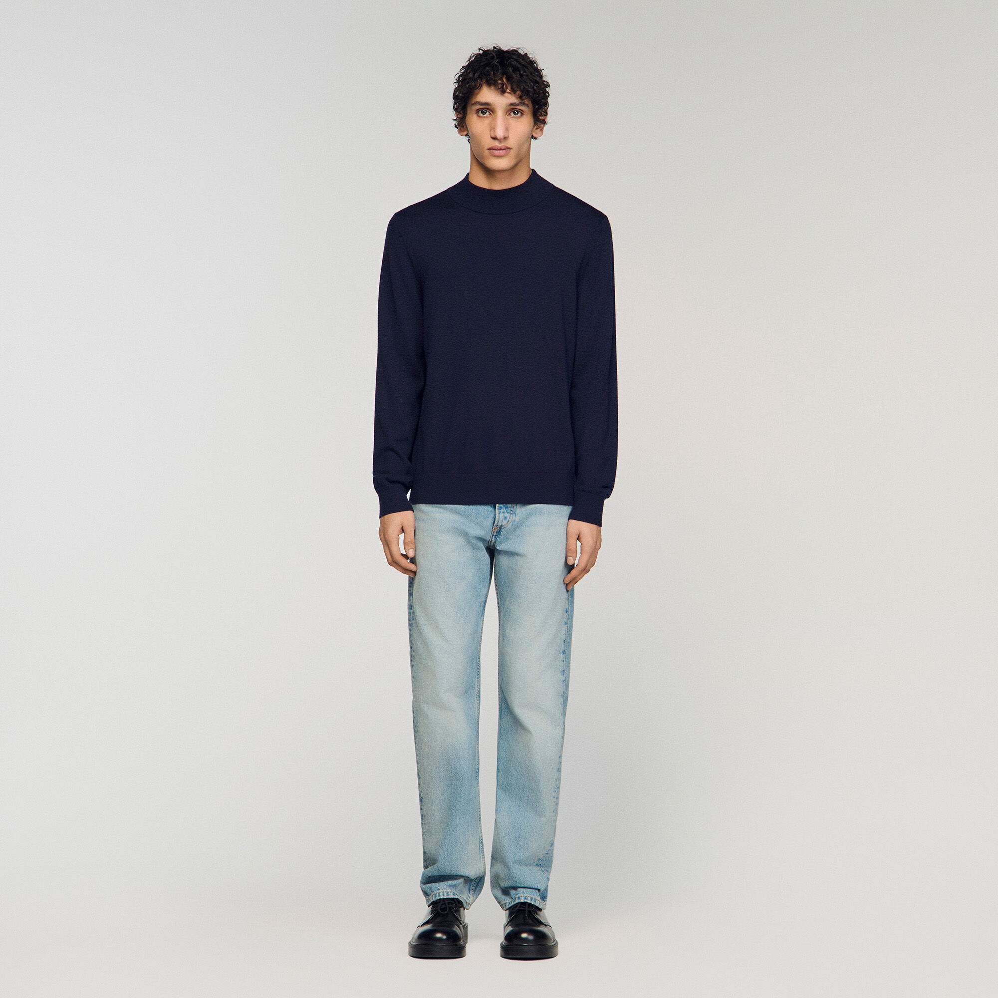 Wool jumper with a high collar