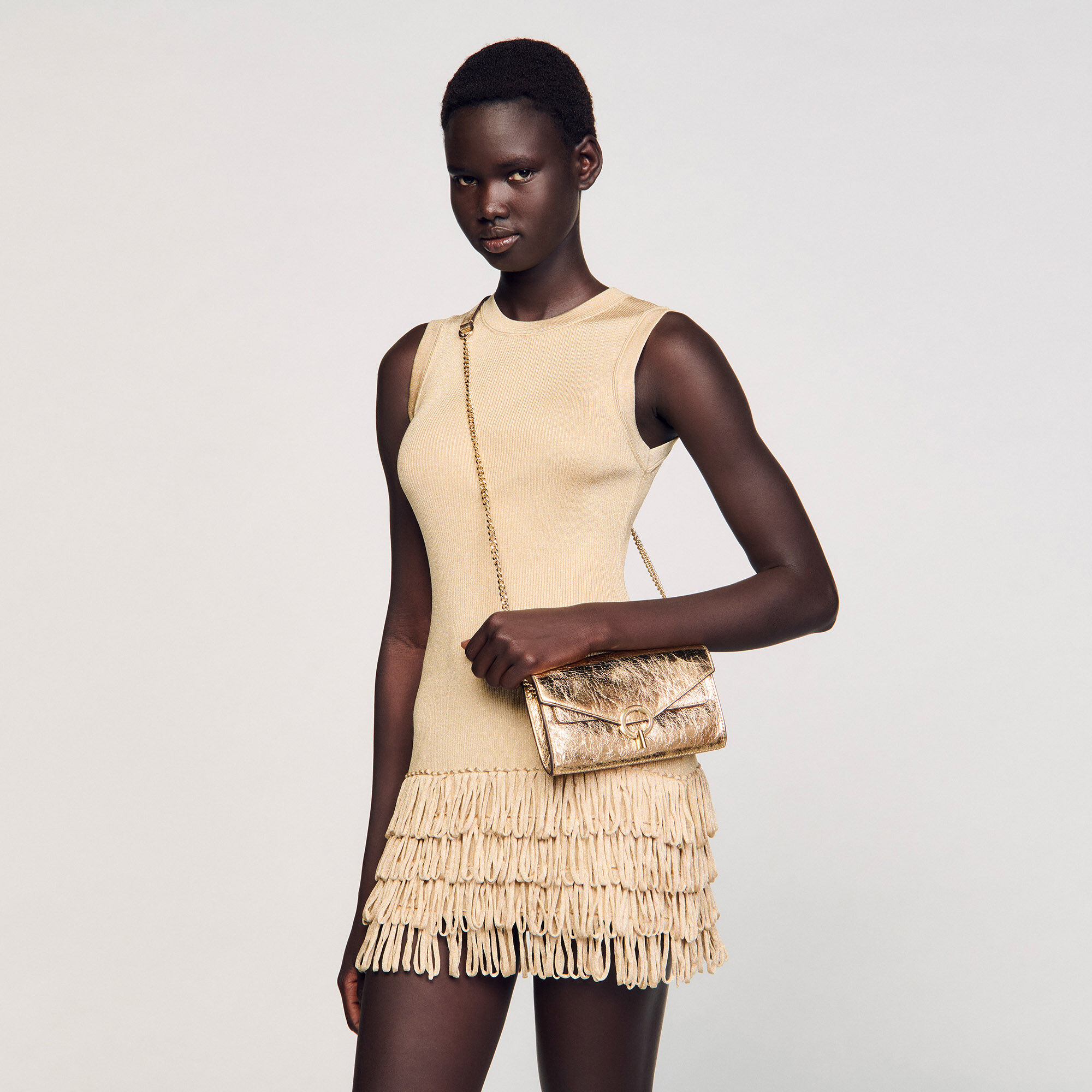 Gold leather clutch bag