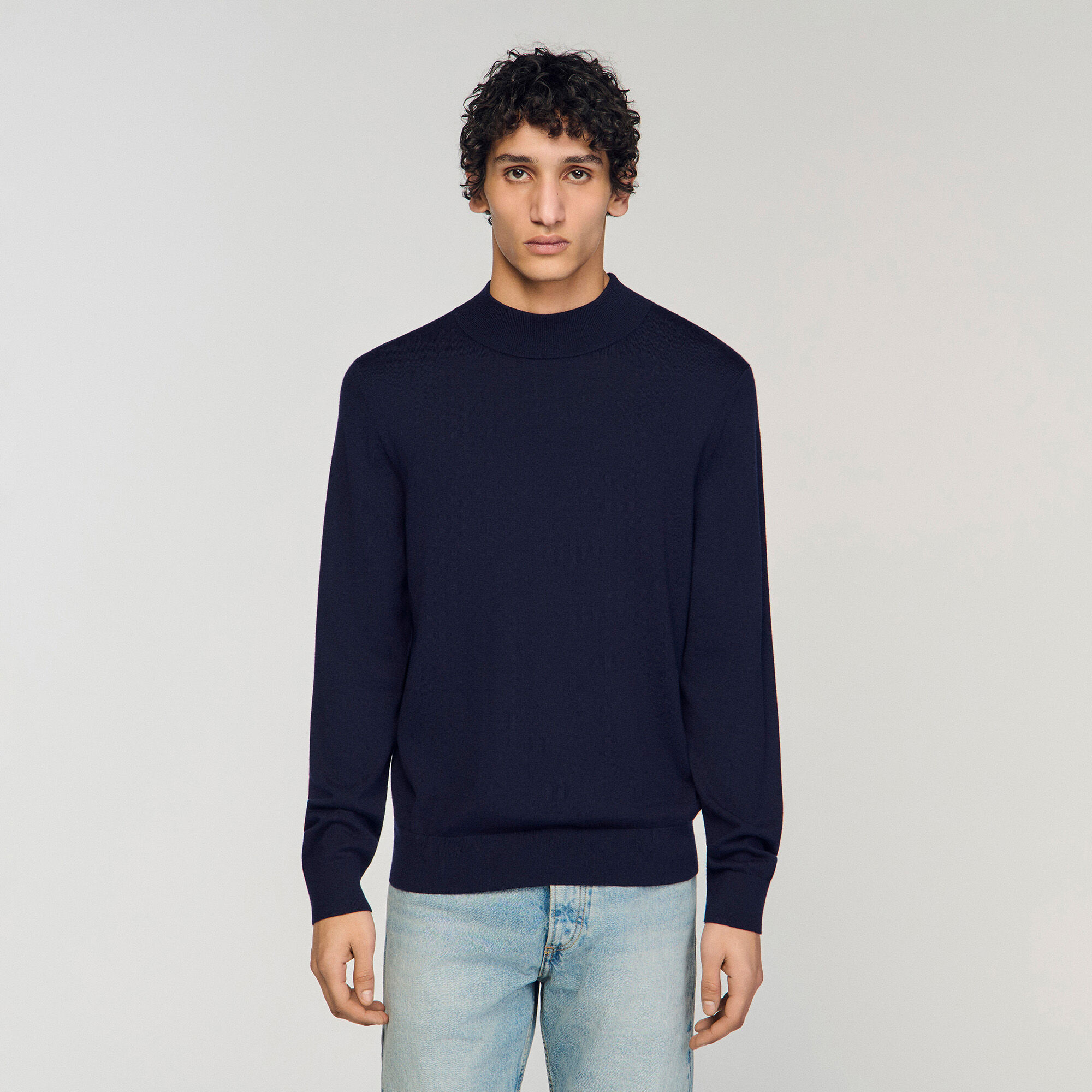 Wool jumper with a high collar