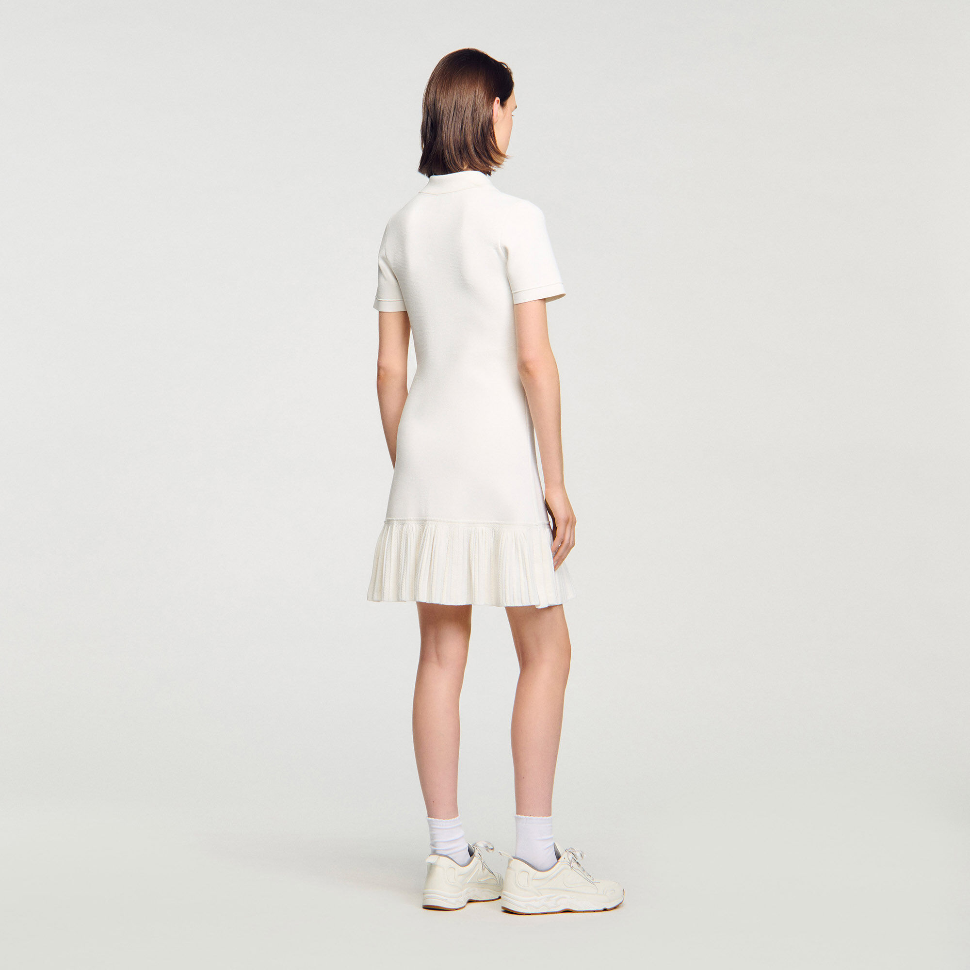 Short knit dress with polo neck