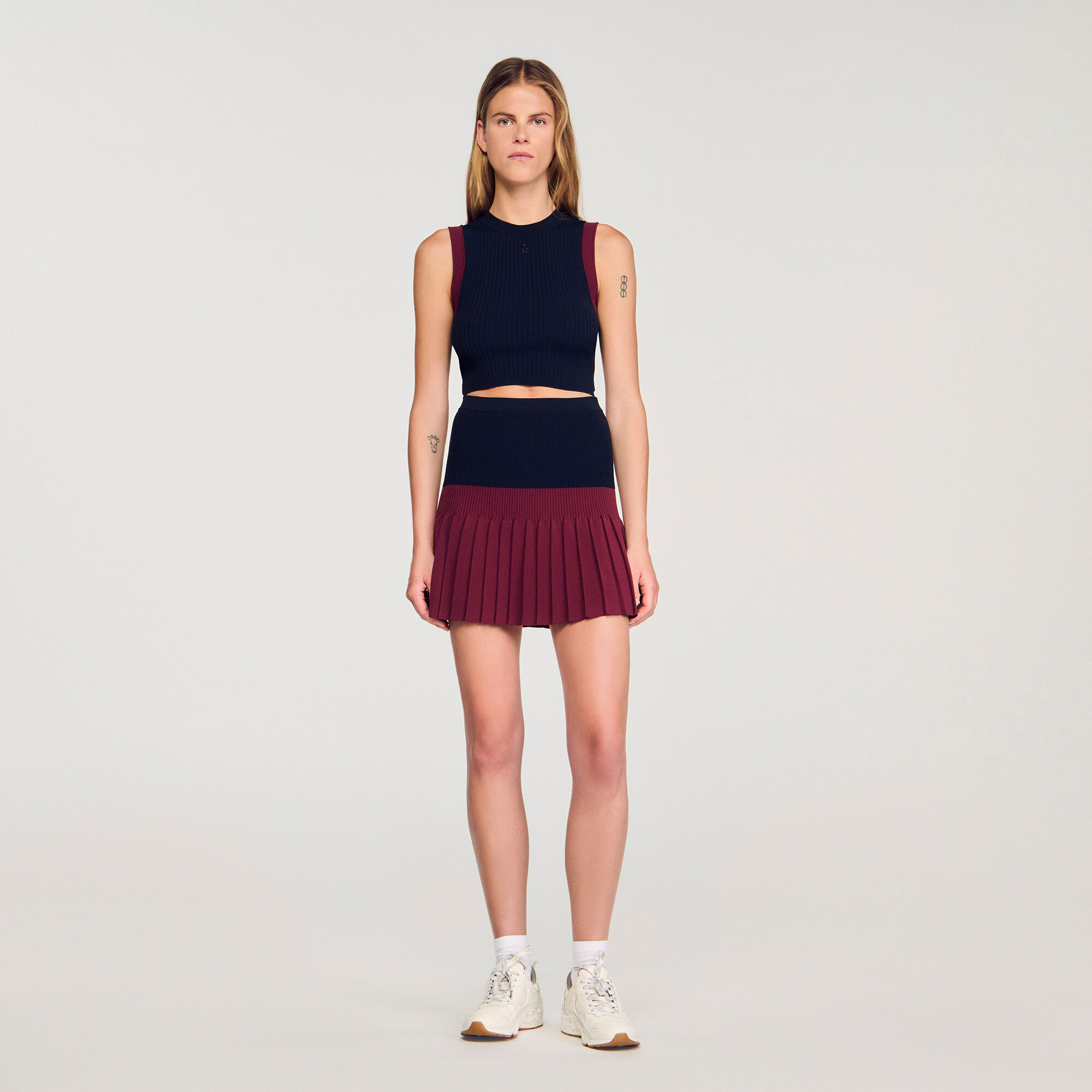 Short two-tone pleated skirt