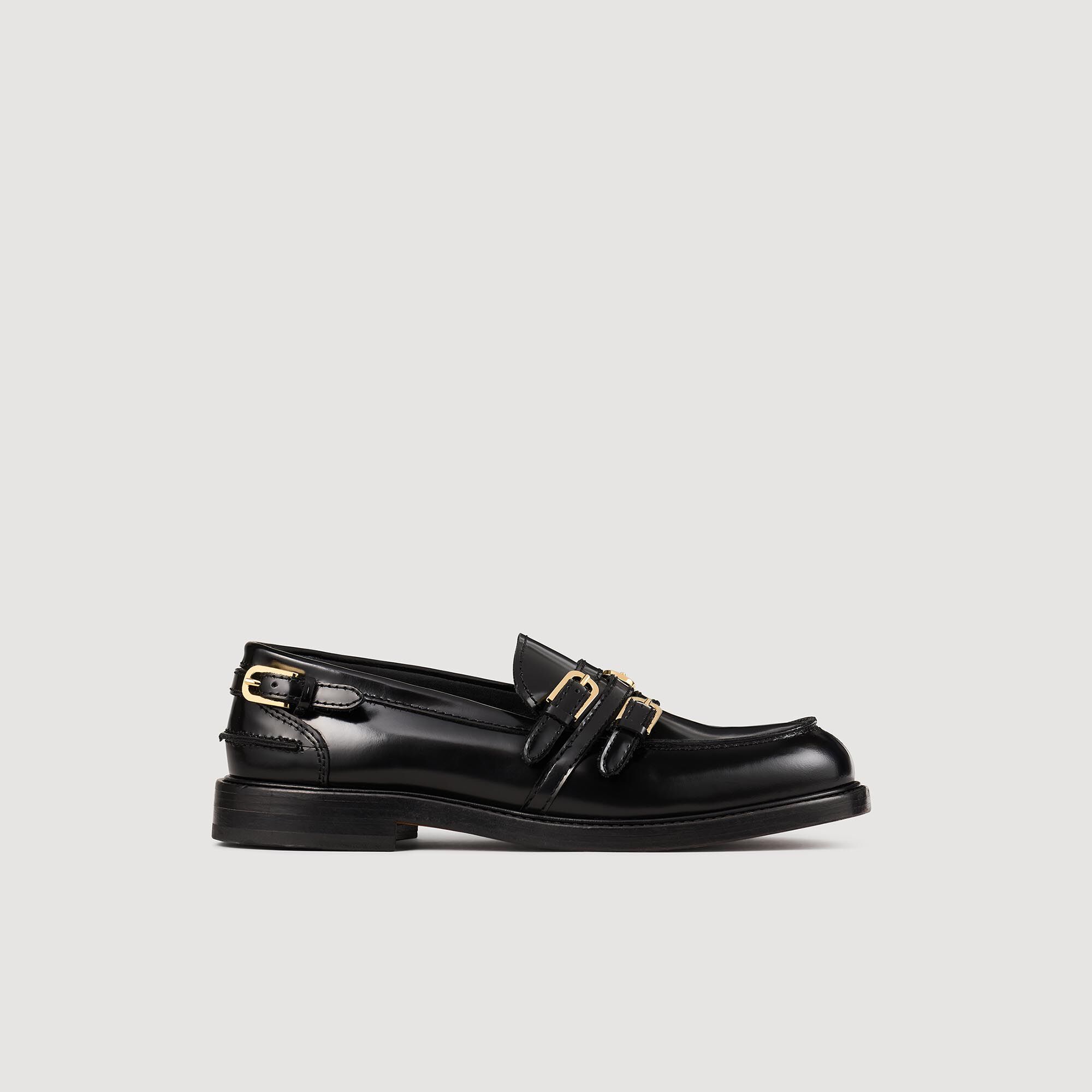 Leather loafers with buckles