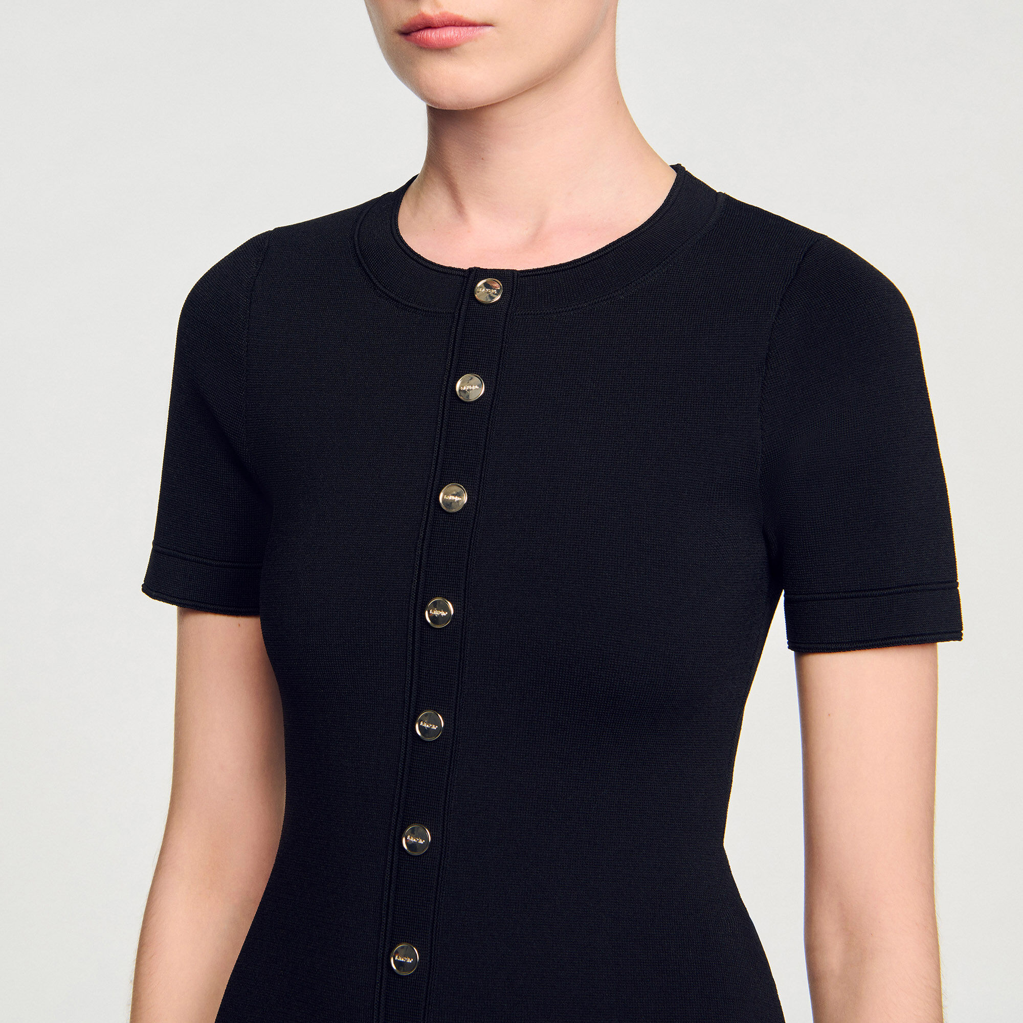 Short knit dress with ruffle