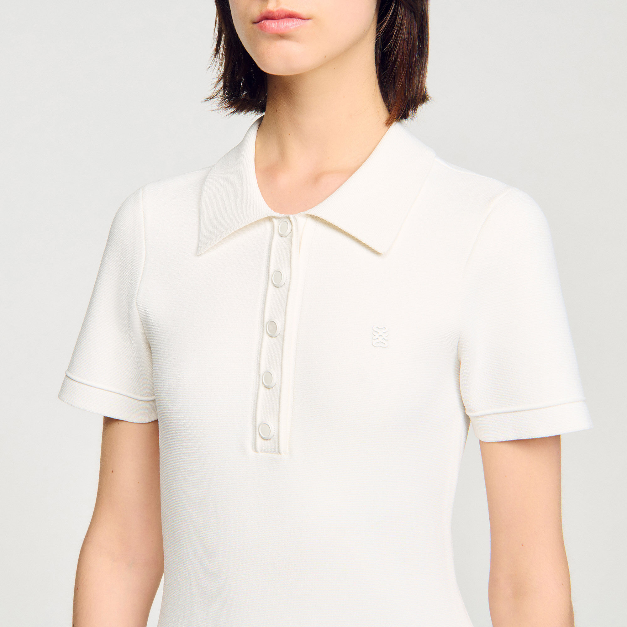 Short knit dress with polo neck