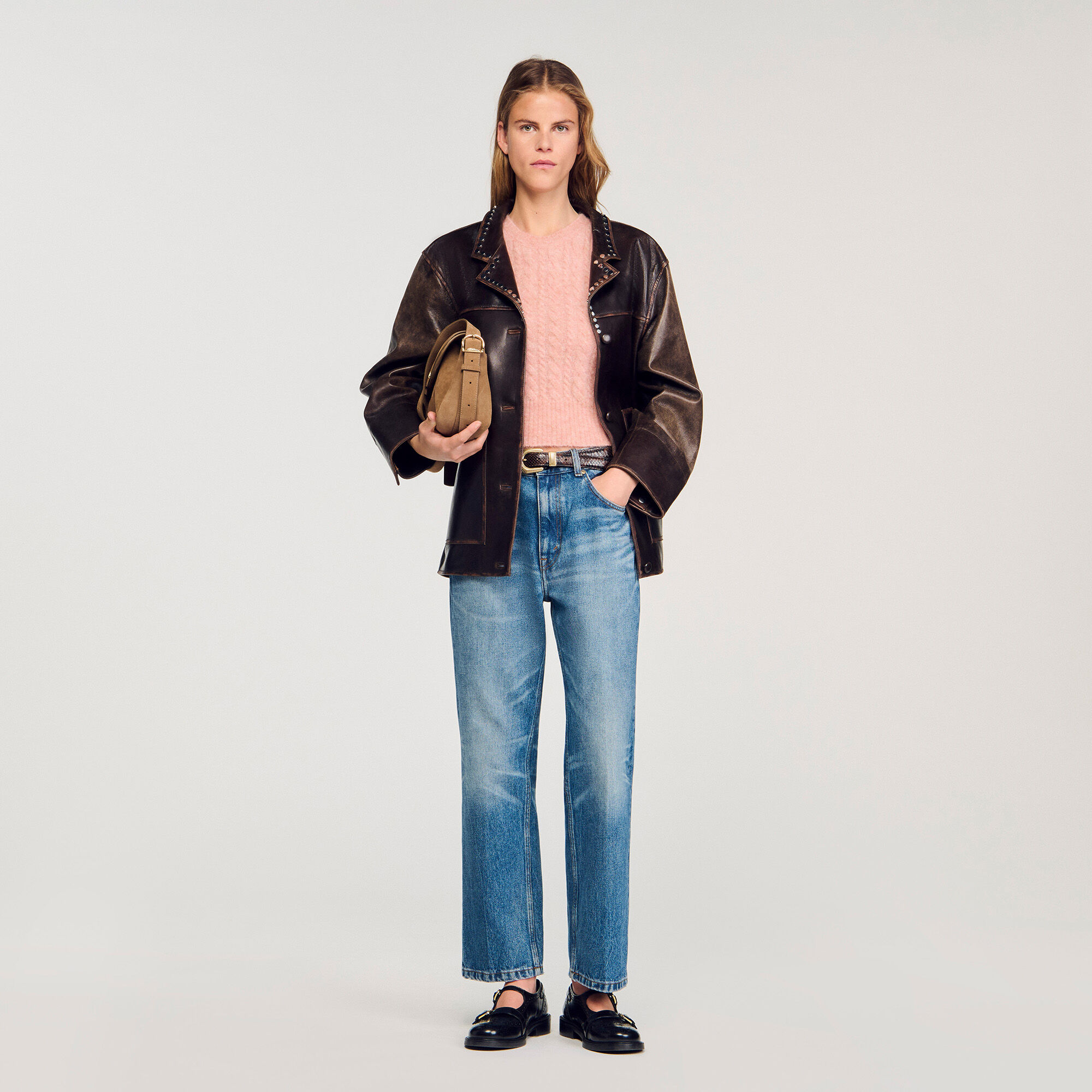 Sleeveless cable knit sweater