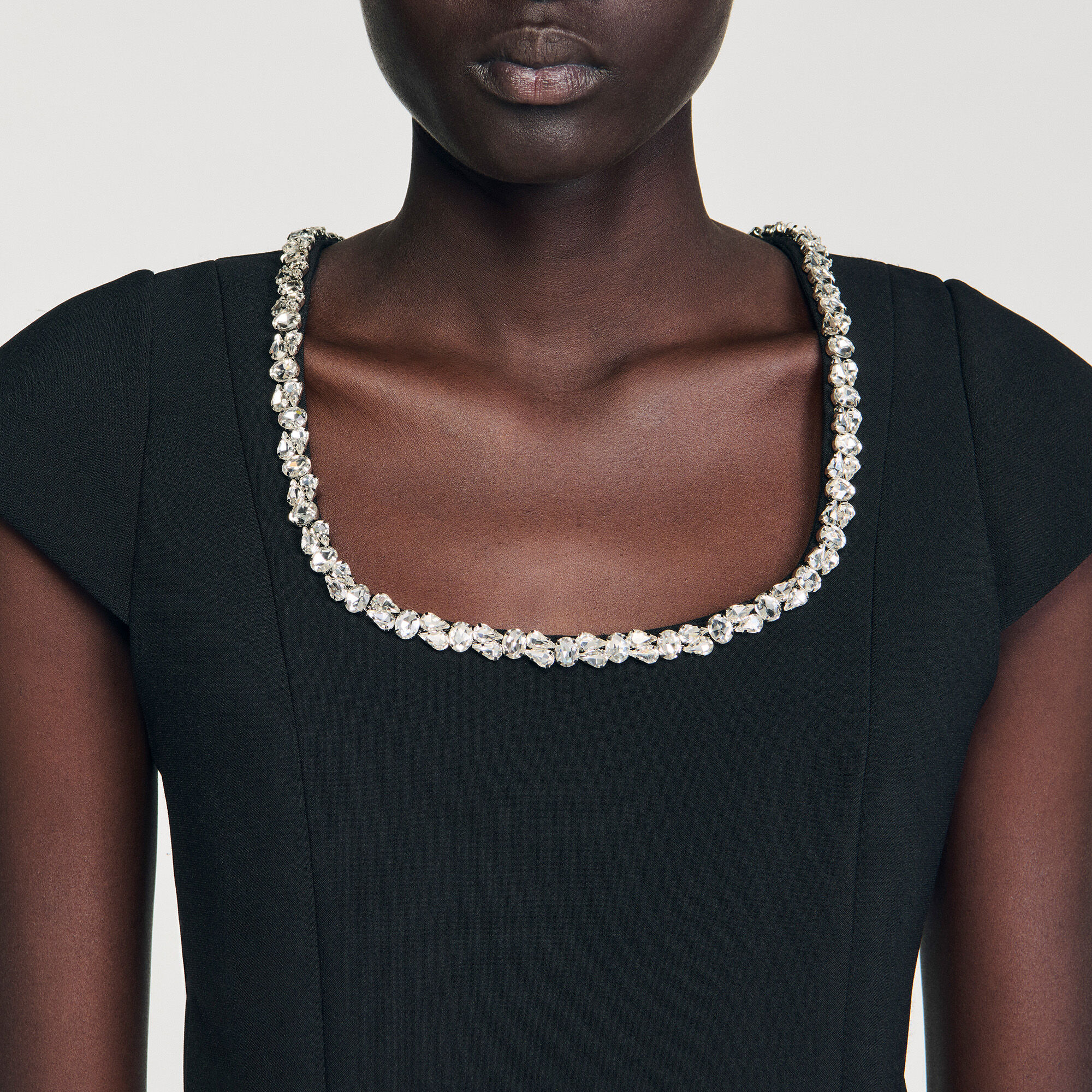 Short dress with rhinestone collar Short dress with rhinestone collar