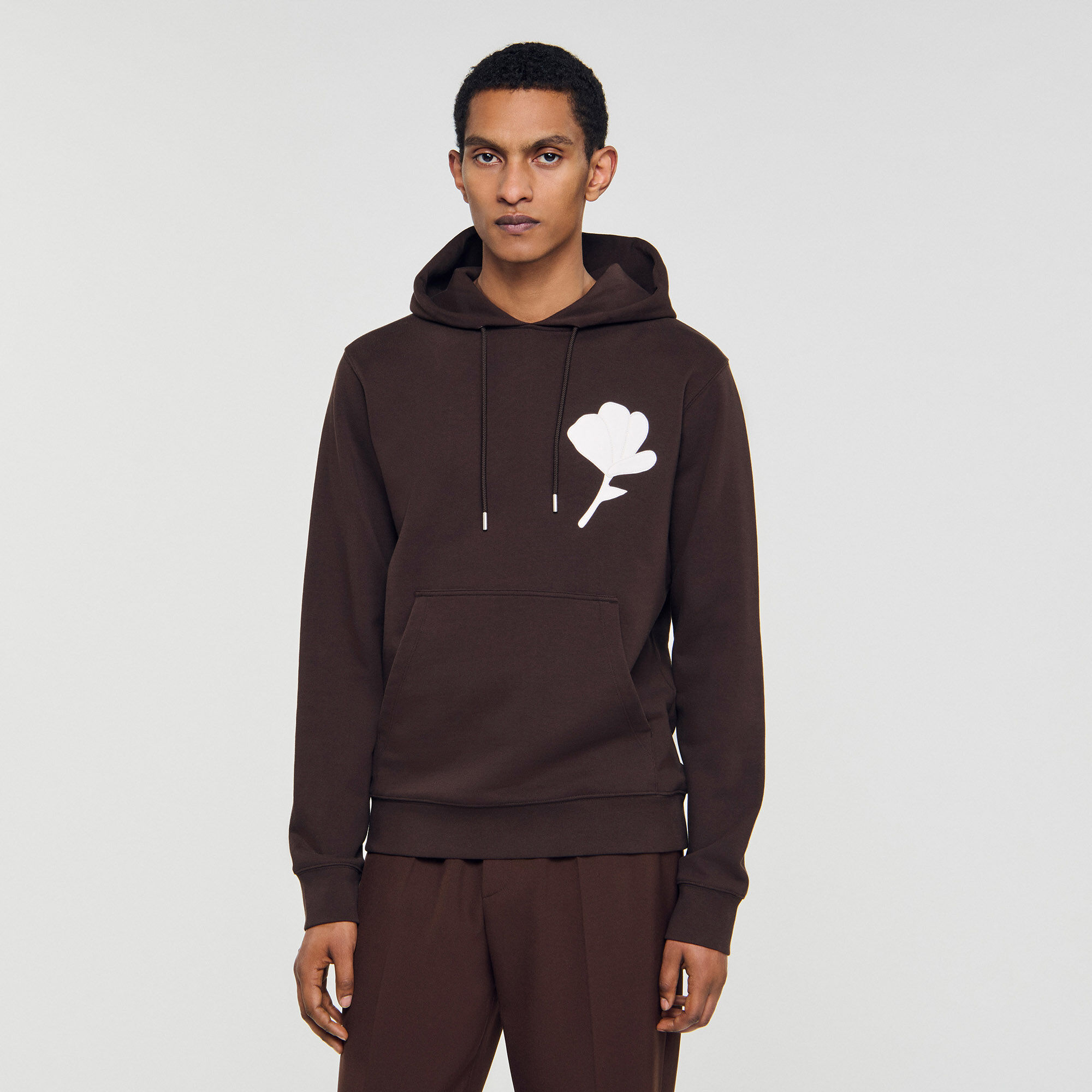 Sweatshirt with flower patch