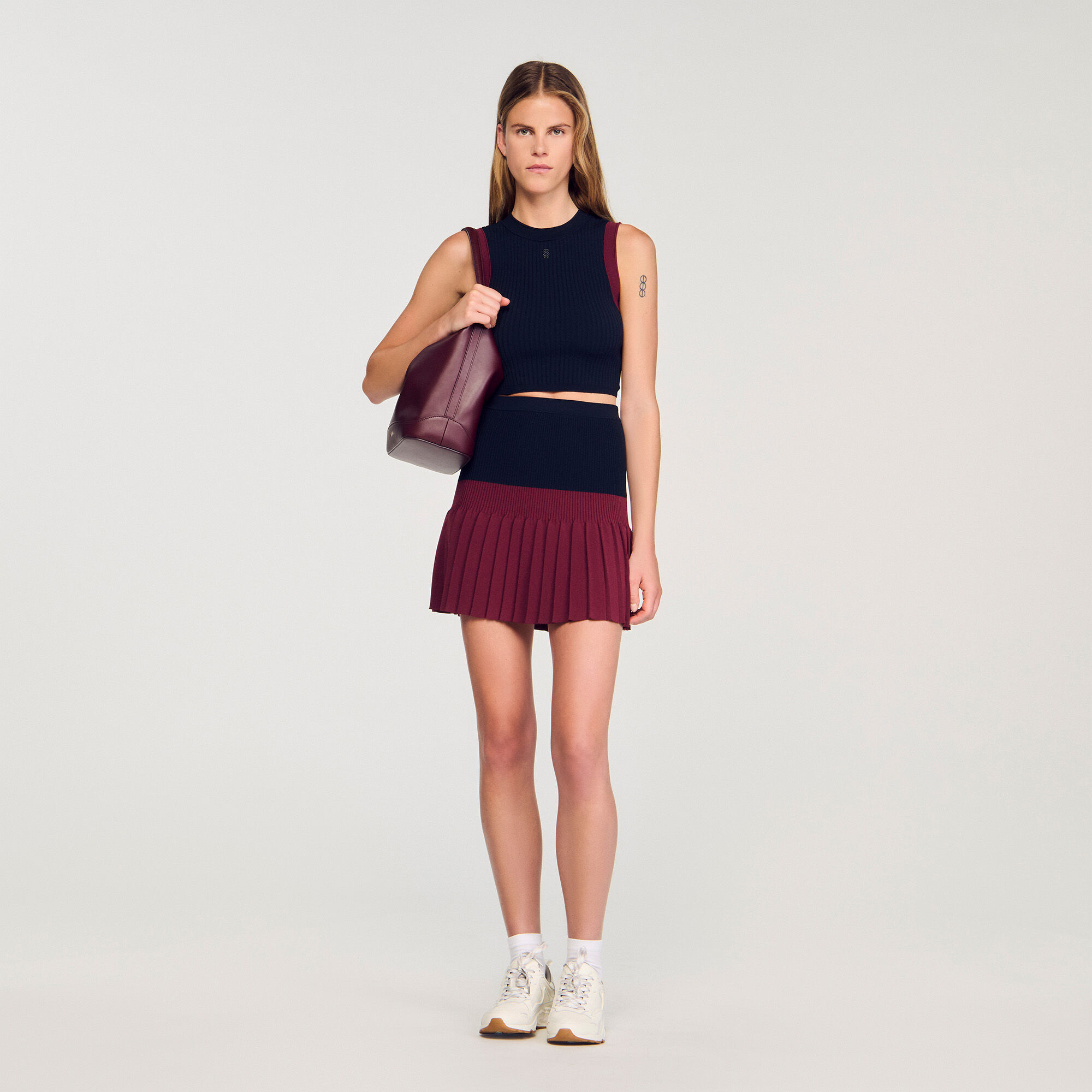 Short two-tone pleated skirt