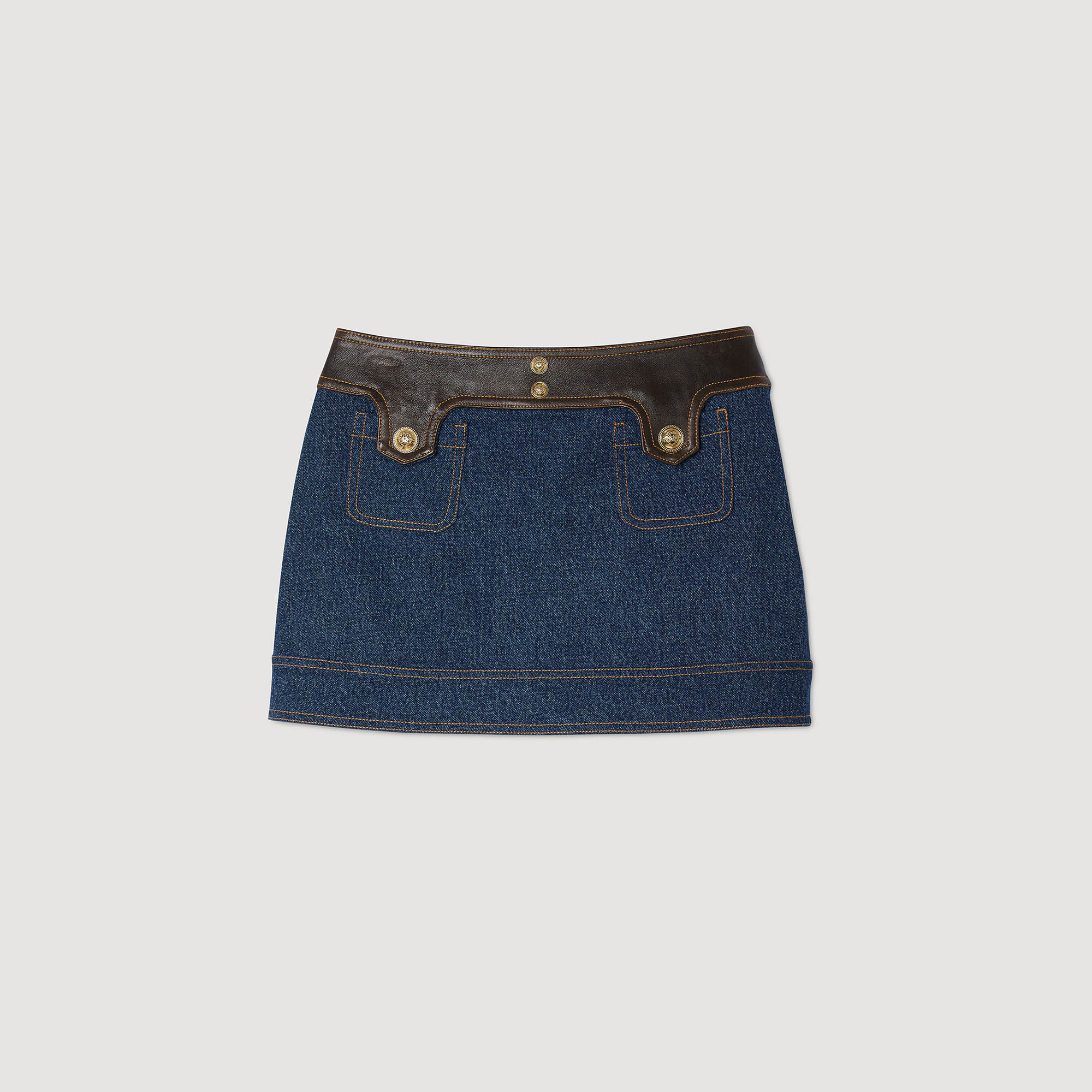 Short denim and leather skirt