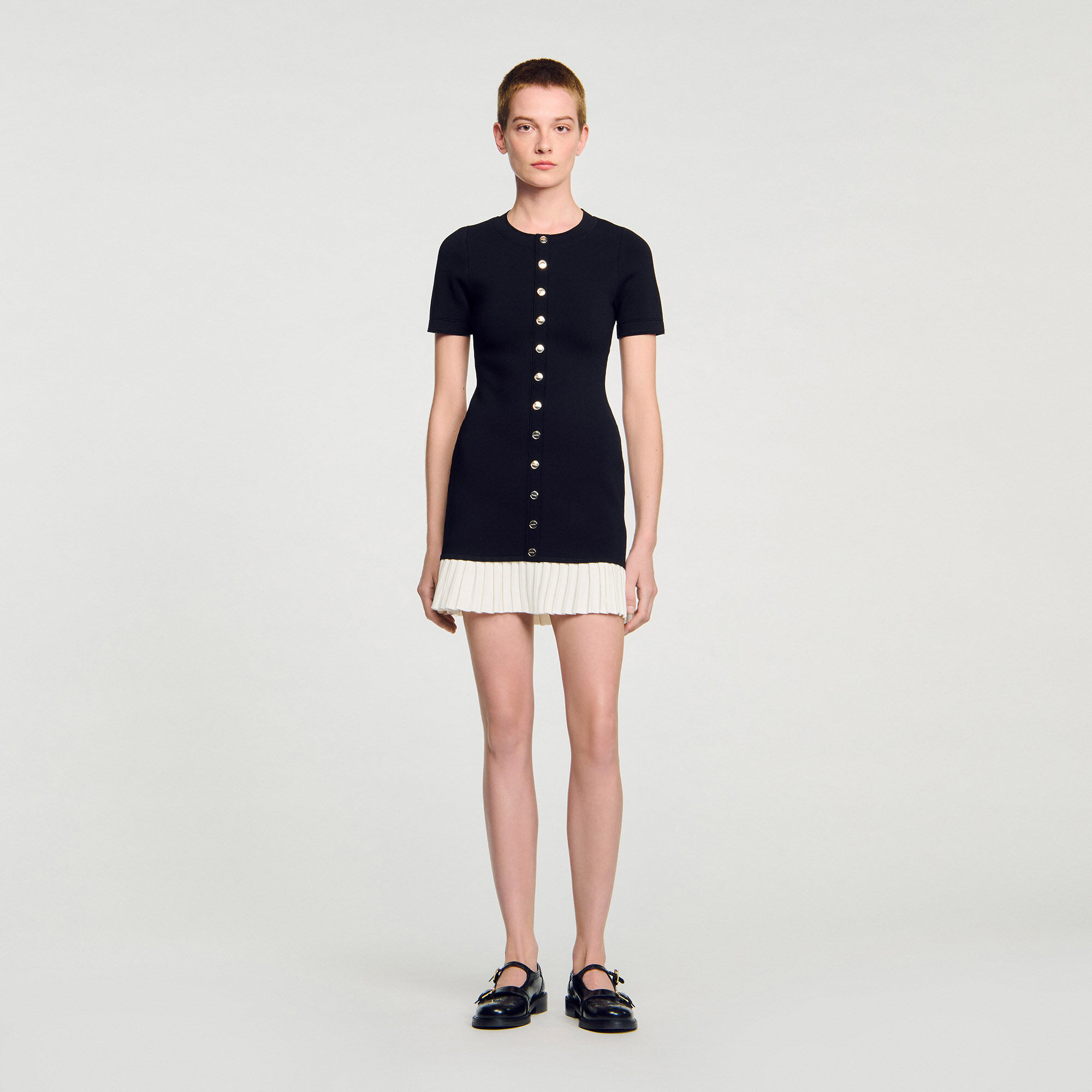 Short knit dress with ruffle