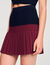Short two-tone pleated skirt