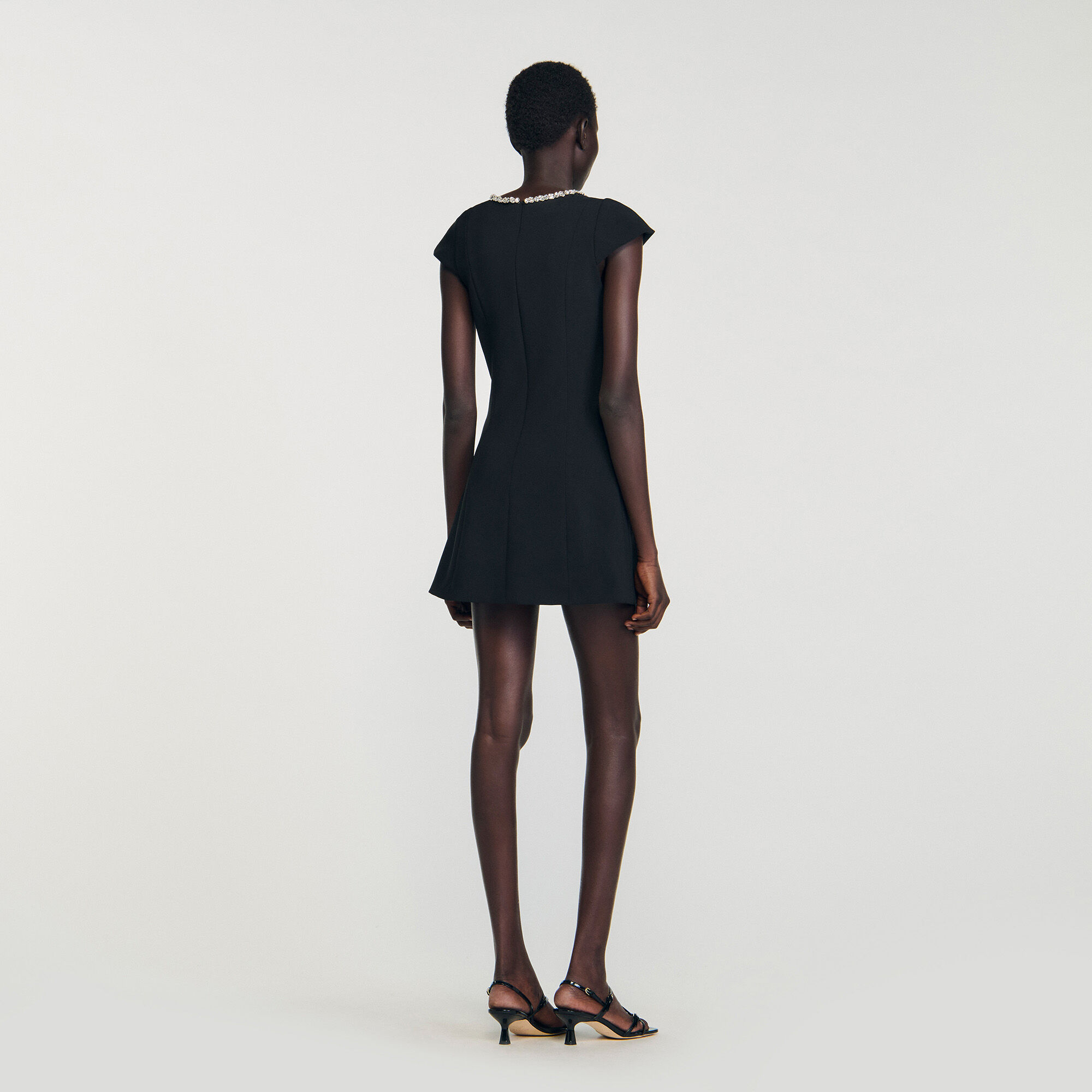 Short dress with rhinestone collar Short dress with rhinestone collar