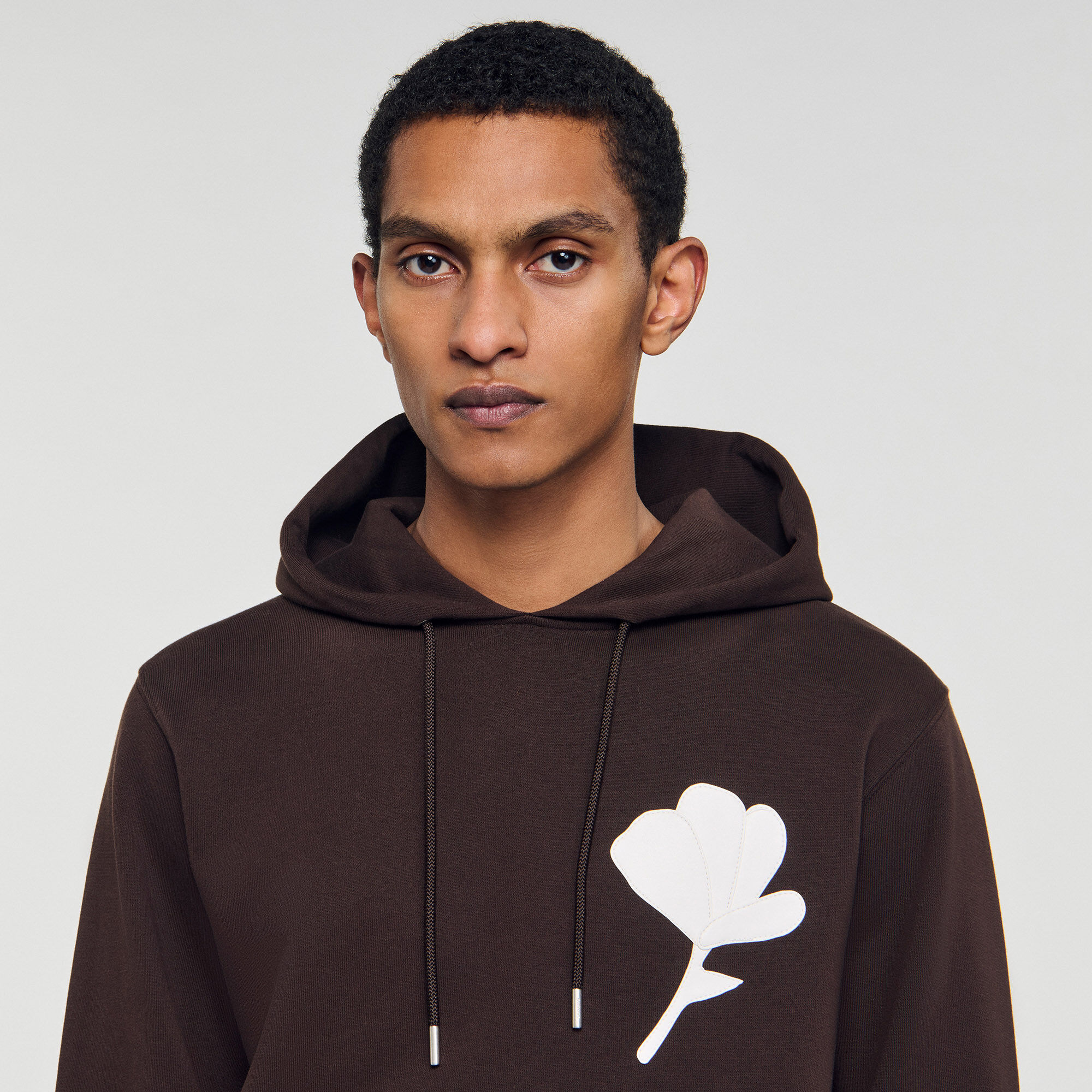 Sweatshirt with flower patch
