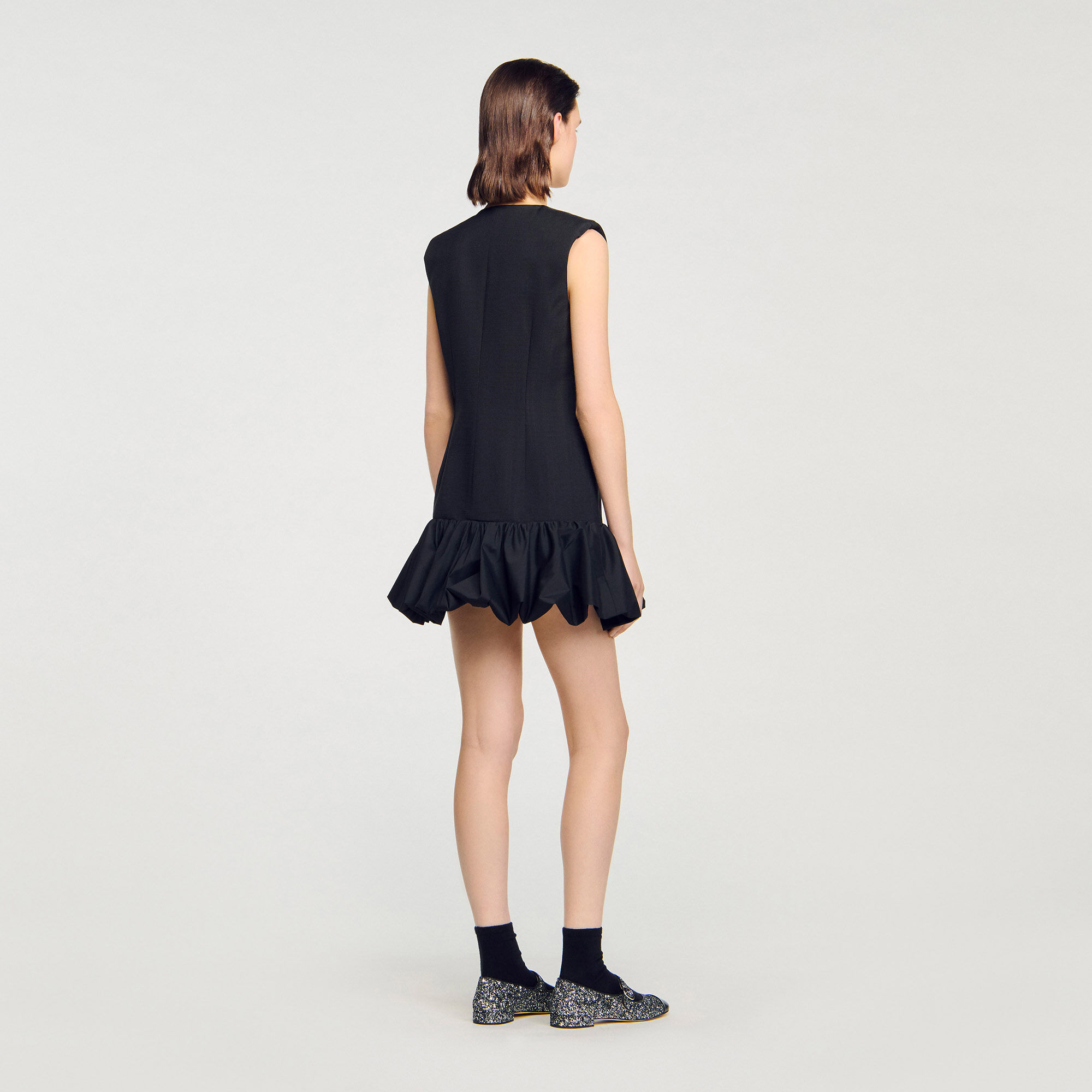 Short tailored dress with ruffle