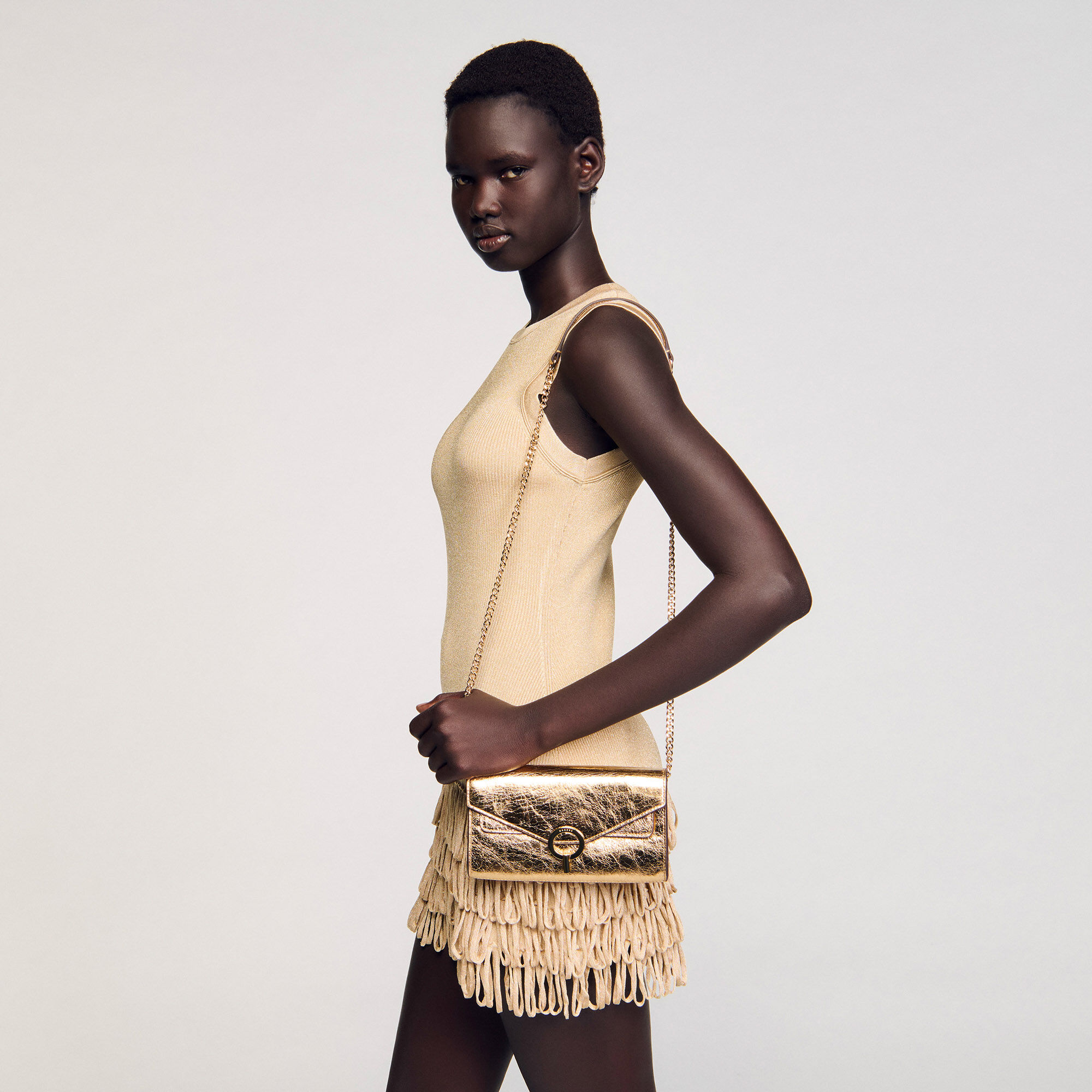 Gold leather clutch bag